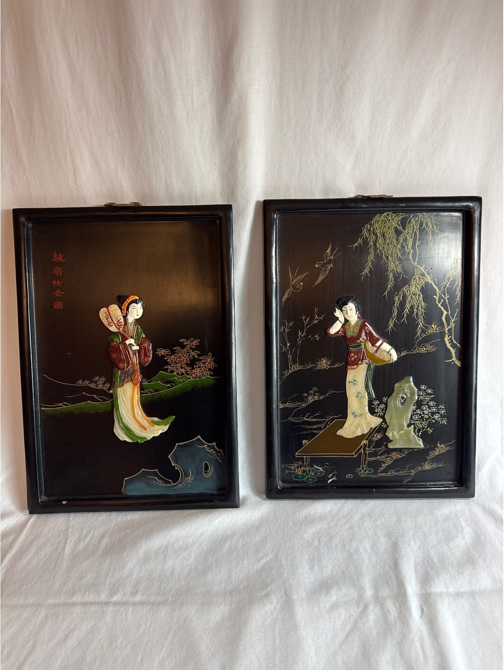 Pair of Vintage Asian Decorative Plaques with Raised Figures
